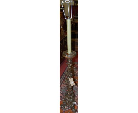 An Italian 18th century carved gilt wood and gesso pedestal stand (later converted into a standard lamp, with losses and repa