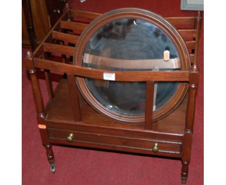 A reproduction mahogany four division canterbury, having single lower drawer; together with a circular toilet mirror (2) 
