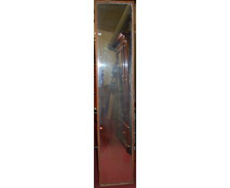 A circa 1900 pine framed wall mirror, 209 x 42cm 
