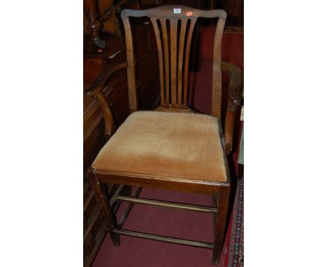 A 19th century walnut Heppelwhite style elbow chair, of raised form; together with a further oak Chippendale style elbow chai