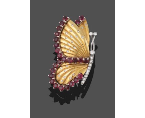 An 18 Carat Gold Ruby and Diamond Butterfly Brooch, the butterfly realistically modelled with one set of wings behind the oth