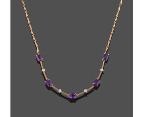 A 9 Carat Gold Amethyst and Diamond Necklace, five oval cut amethysts alternate with four round brilliant cut diamonds in yel