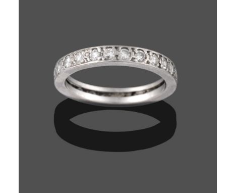 A Diamond Eternity Ring, the eight-cut diamonds in white claw settings, total estimated diamond weight 0.85 carat approximate