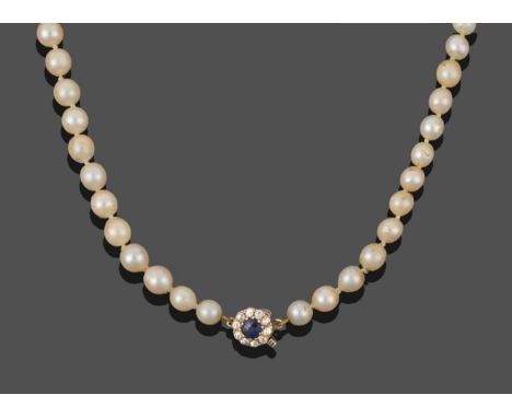 A Cultured Pearl Necklace, eighty-eight off-round cultured pearls knotted to a circular clasp comprising of a round cut sapph