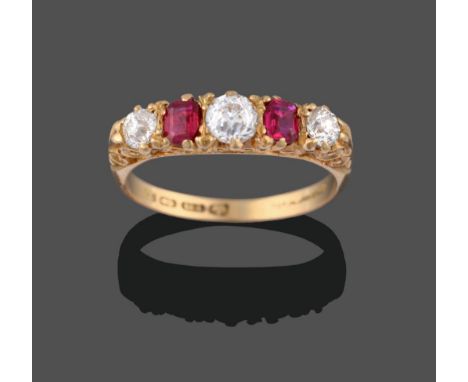 An 18 Carat Gold Ruby and Diamond Five Stone Ring, three graduated old cut diamonds alternate with two emerald-cut rubies, in