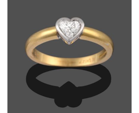 An 18 Carat Gold Heart Shaped Diamond Solitaire Ring, the diamond in a white rubbed over setting on a yellow plain polished s