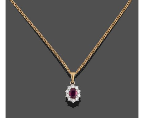 An 18 Carat Gold Ruby and Diamond Cluster Pendant on Chain, the oval mixed cut ruby within a border of round brilliant cut di