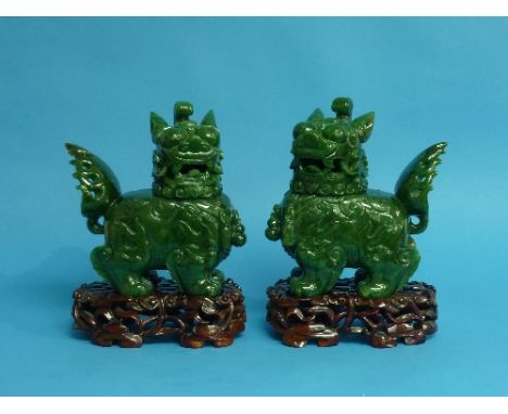 A Chinese dark spinach green jade Censers, each carved in the form of Temple Lion figures with open mouths, detachable heads 