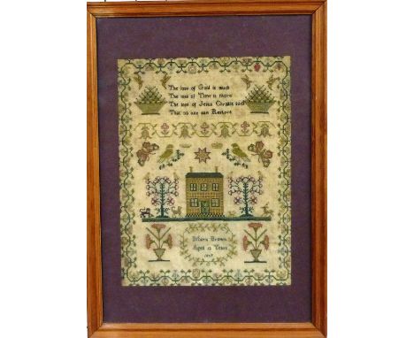 A mid-19th century English or Irish silk on linen Sampler, with a verse above a house, with flowers, birds and butterflies wi