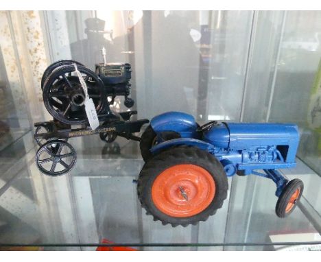 A Chad Valley Diecast Fordson Major Tractor, Large scale blue diecast body, orange wheel hubs, hinged bonnet and "chad Valley