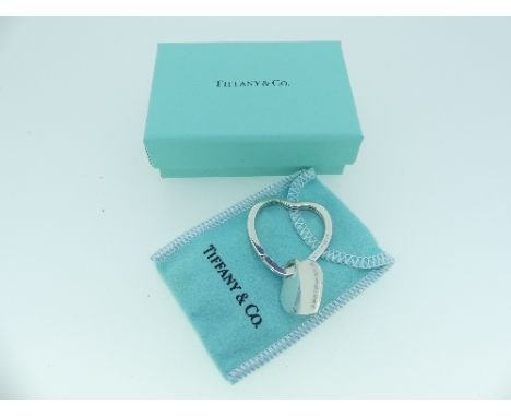 A silver Tiffany &amp; Co. heart-shaped Key Ring, suspending a signed heart-shaped tag, both marked Tiffany &amp; Co. 925, wi
