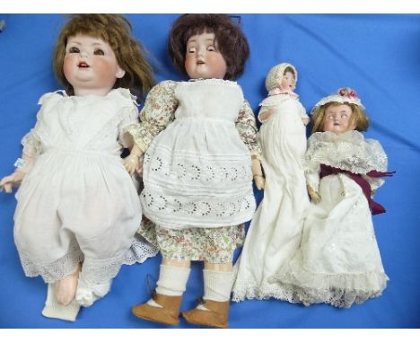 4 Bisque Headed Dolls, including: a Schoenau &amp; Hoffmeister with applied brown hair, open mouth with 4 teeth, composition 