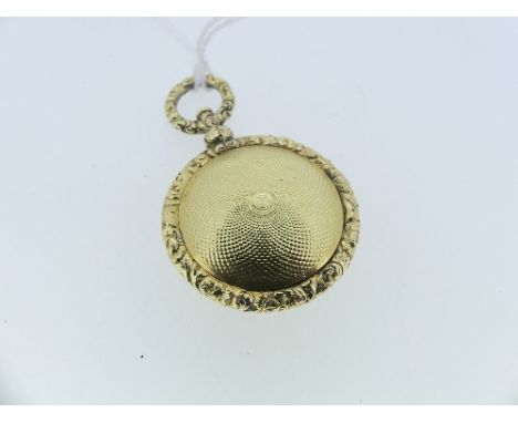 An early 19thC circular Vinaigrette, with engine turned decoration and foliate border, the interior with foliate pierced gril