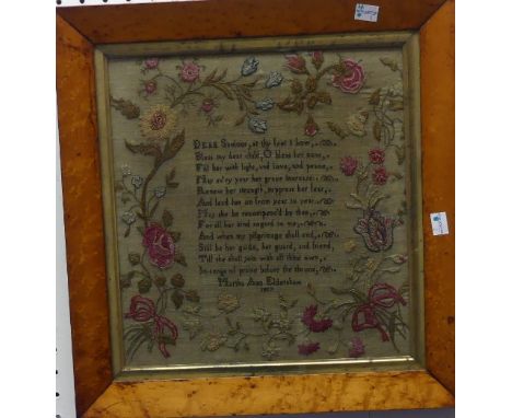 An early 19th century Sampler, with a verse surrounded by a wide floral border, by "Martha Ann Eldershaw 1817", 14in x 13in (