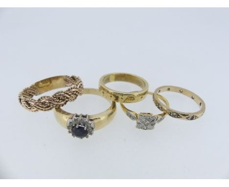 A collection of five Rings, including an unmarked wedding band, 5.5g, Size P, a sapphire and white paste cluster ring, a 9ct 