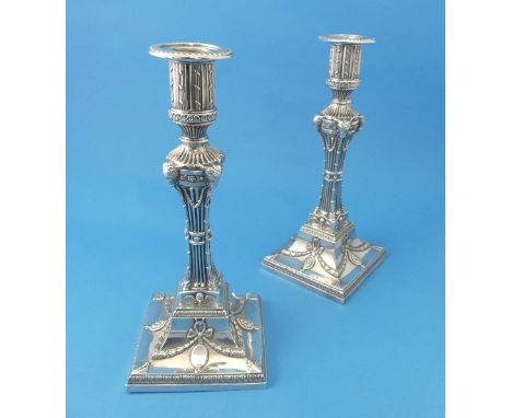 A pair of George III silver Candlesticks, by George Ashworth, hallmarked Sheffield, 1775, of neoclassical 'Adams style' with 