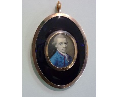 18th century English School, oval portrait miniature of a gentleman in blue jacket, watercolour on ivory, in oval gilt metal 