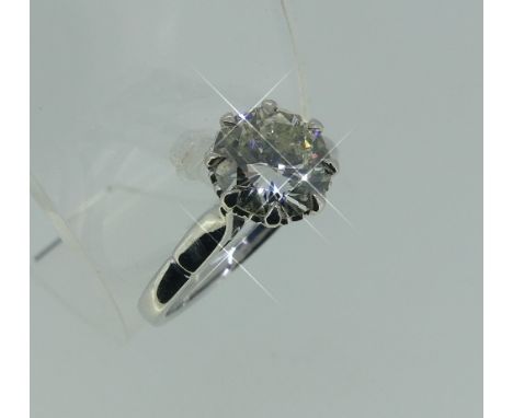 A diamond solitaire Ring, the brilliant cut stone approx. 1.95ct, set in an eight claw scroll mount, the shank marked 18ct, S