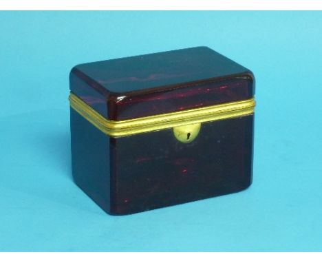 A 19th century French ruby glass Casket, with gilt metal mounts, 5½in (14cm) wide. 