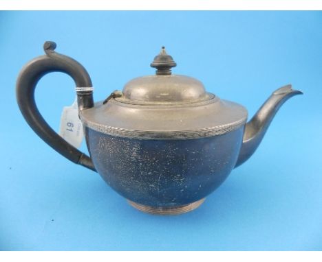 A George VI silver Teapot, by George Howson, hallmarked Sheffield, 1938, of plain circular form with wooden handle and finial