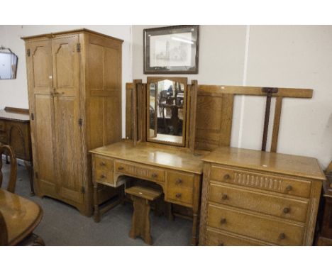 WEBBER FURNITURE, LYMINGTON, JACOBEAN STYLE CARVED LIMED OAK BEDROOM SUITE OF 5 PIECES, COMPRISING; A WARDROBE, A CHEST OF DR