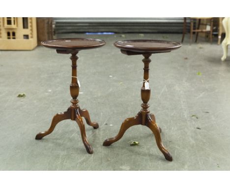 A PAIR OF MODERN REPRODUCTION MAHOGANY TRIPOD WINE TABLES (2)