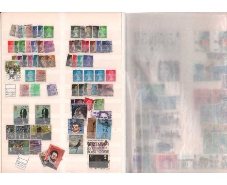 GB Stamp Collection 1. Large black Importa Stamp Album containing GB fine used stamps. 40 pages, each one containing many sta