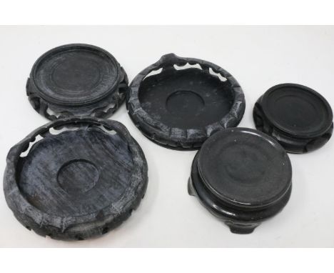 Five Chinese hardwood carved vase stands, largest D: 12 cm. UK P&amp;P Group 2 (£20+VAT for the first lot and £4+VAT for subs