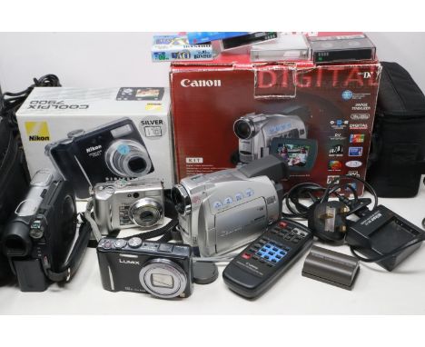Nikon Coolpix 7900 digital camera, boxed with accessories, a Panasonic Lumix and two video cameras. UK P&amp;P Group 3 (£30+V