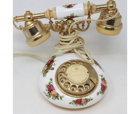 Royal Albert Old Country Roses rotary ceramic telephone, damage to holder. UK P&amp;P Group 3 (£30+VAT for the first lot and 