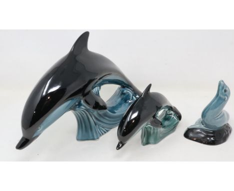 Large and small Poole dolphin and a seal, no cracks or chips, largest L: 30 cm. UK P&amp;P Group 3 (£30+VAT for the first lot
