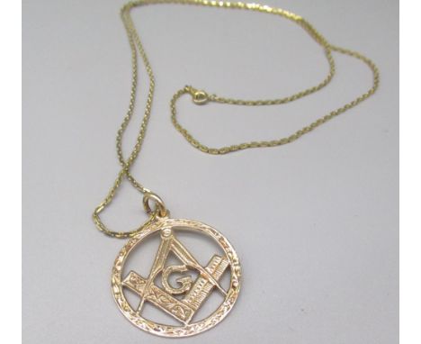 9ct yellow gold Masonic Square &amp; Compass pendant, stamped 375, on yellow metal chain, L76cm approx., gross 12.4g 