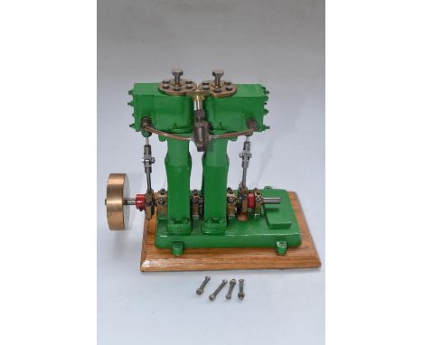 Built up Stuart Models D10 steam powered stationary engine, all metal construction in glass and wood display case and "Buildi