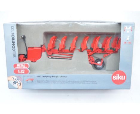 Siku "Control", 1/32 remote control plough with instructions (item no 6783) 