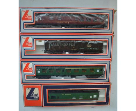Four Lima OO gauge railway wagons/coaches to include 2 restaurant cars, Palethorpes Royal Cambridge goods wagon and a corrido