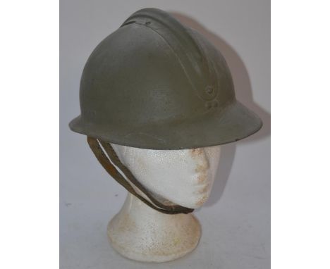 WW2 French Army M26 Adrian steel helmet with liner and chinstrap. Helmet appears re-painted 