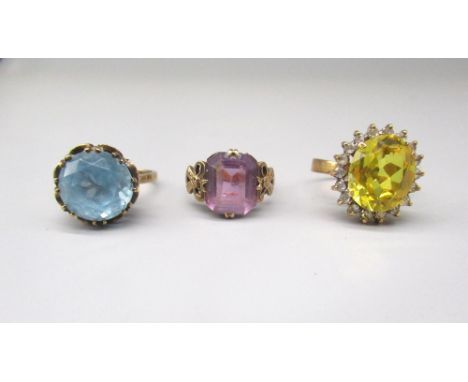 9ct yellow gold ring set with large blue stone, stamped 375, size O1/2, a 9ct yellow gold ring set with purple stone, size M,