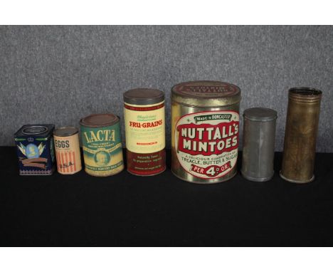 A collection of vintage tinned foods including an unopened can of 'Lacta (Full Cream) Next Best to Breast Milk' and an unopen