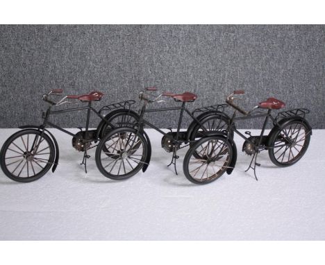 Three decorative model mini bikes. Metal. H.17 W.30cm. (each) 