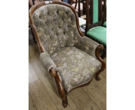 A Victorian button back elbow chair