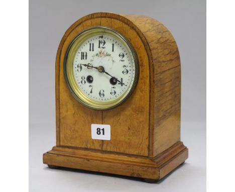 A Victorian satinwood mantel clock
