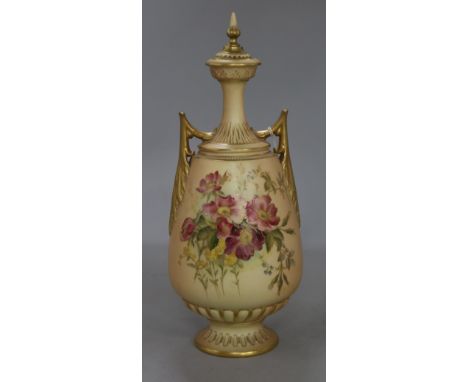 A Royal Worcester blush ivory two-handled vase and cover