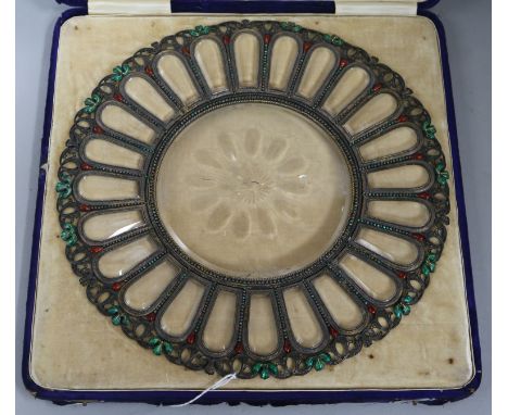 An Indian plate and enamel-mounted sectional glass dish in the form of a flower head, the pierced mount applied with green an
