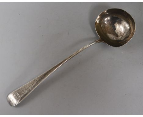 A Victorian silver soup ladle G.A. London 1868