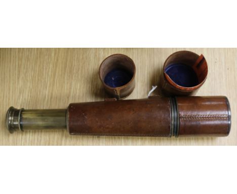 A three drawer telescope 'Reconditioned for John Barker & Co Ltd by Broadhurst Clarkson & Co'