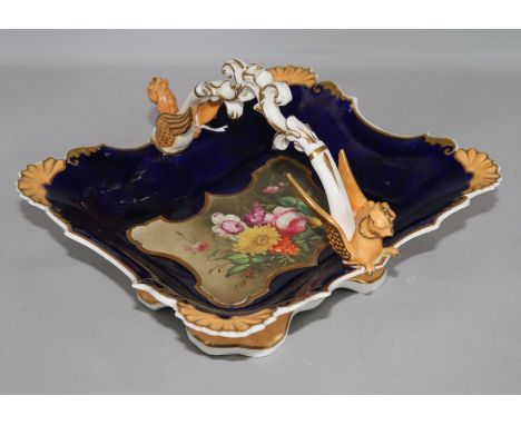 A Victorian ceramic flower painted basket