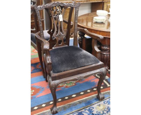 A set of eight Chippendale style chairs