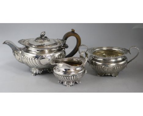 A George III silver three-piece tea service, London 1815, maker probably Joseph Angell