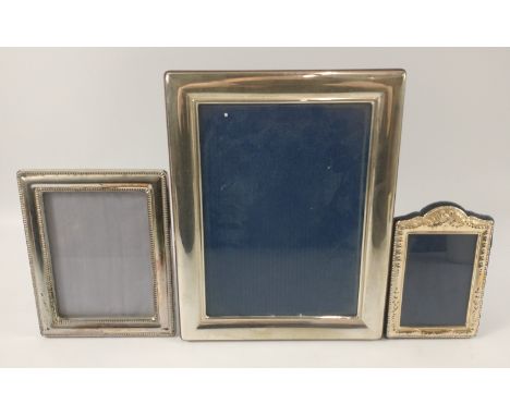 A large 925 stamped SILVER photograph frame dimensions 23cm x 18cm gross weight 353g approx, also a smaller 925 stamped decor