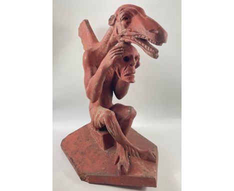 FABULOUS AND RARE IN DESIGN!! A large VICTORIAN terracotta roof ridge tile GARGOYLE FINIAL clutching a human skull, stands 50